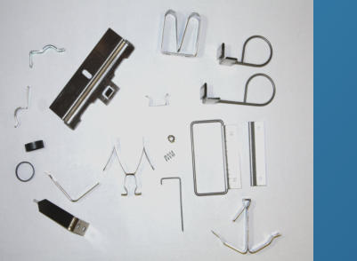 A selection of brackets, springs and clips
